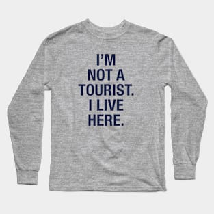 I'm not a tourist. I live here. (navy) Long Sleeve T-Shirt